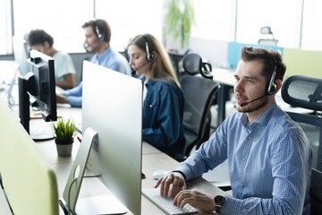 Colleagues working in a call center.