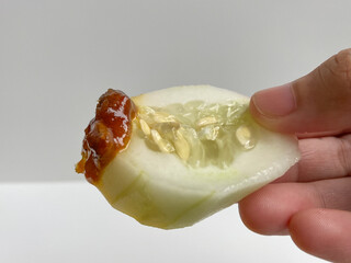 Rujak, traditional salad from Indonesia, consist of cucumber slices and sambal rujak or spicy salad...