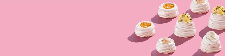 Dessert Anna Pavlova banner pink background. Copy space free place for your text. Pastry chef concept.