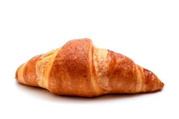 Close-up of golden croissant on white background. French pastry