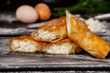 Traditional fried pies from Romania with potatoes, cheese and cabbage. Romanian food.