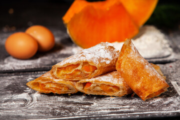 Traditional fried pies from Romania with potatoes, cheese and cabbage. Romanian food.