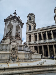 Fototapeta na wymiar Church Saint-Sulpice and the fountain in front of her. Paris. France