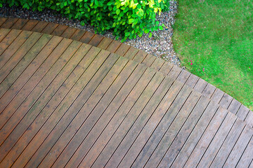 exotic wood terrace prepared for cleaning with a high-pressure washer - condition before conservation of wooden surfaces - 723917733