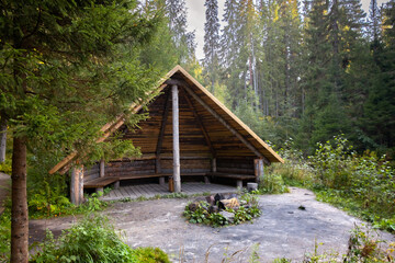 Wooden house in the forest. Wooden hut, camping