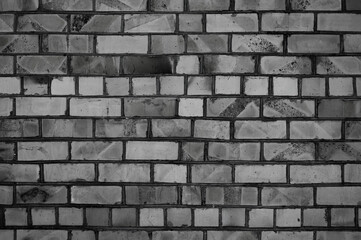 old brick wall close up in gray color