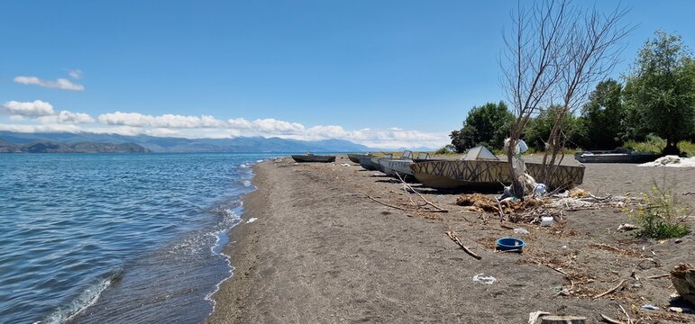 boats on the bank of lake Sevan in armenia rather old models