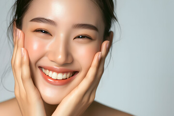 Closeup Beautiful smiling asian korean woman touch face with smooth healthy skin
