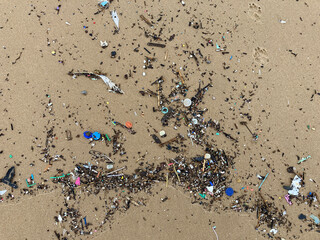 Storm and beach polution with plastics, microplastics, foam, pellets and debribs.