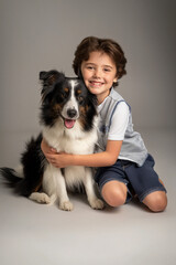 Young boy with border collie