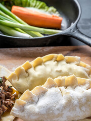Close-Up of Preparing Homemade Beef Stuffed Empanada - Engaging 4K Ultra HD Image of Culinary Creation