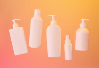White dispensers with various care products. Hygienic supplies.