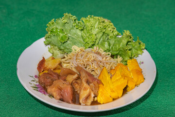 Tahu campur Lamongan (Mixed tofu), is a signature dish from Lamongan, East Java, Indonesia. It has rice cake, noodle, tofu, beef, bean sprout in beef curry.