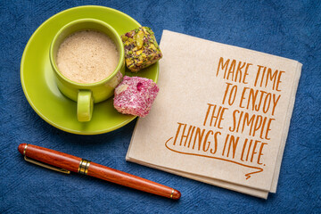 Make time to enjoy the simple things in life - inspirational note on a napkin with cup of coffee, self care and personal development concept