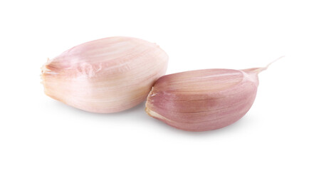 Unpeeled cloves of fresh garlic isolated on white
