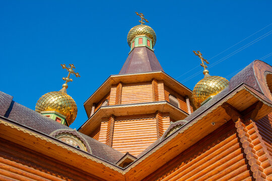 Exterior view Russian Orthodox Church of the Archangel Michael built in the style of Russian wooden architecture with golden cupolas in the Altea Hills urbanization, Altea, province of Alicante, Spain