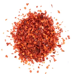 Foto auf Acrylglas Pile of red chili pepper flakes isolated on white background © Kondor83