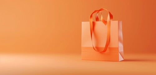 Empty paper bag mockup in vibrant tangerine with a rose gold ribbon handle.