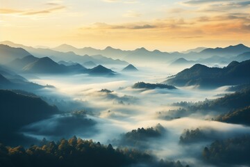 Fototapeta premium Aerial view of misty mountains at sunrise