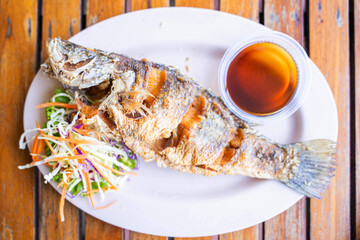 deep fried fish serve with fish sauce
