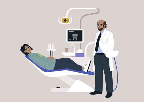 In a dental clinic, a patient sits in a dentist chair surrounded by various tools, including a monitor displaying an x-ray image, they engage in a discussion about the treatment plan with a doctor