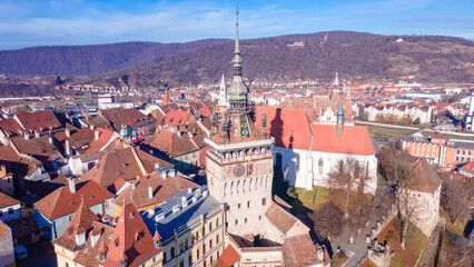 Birds eye view over Sighisoara city. Aerial photography of medieval city of Sighisoara from...