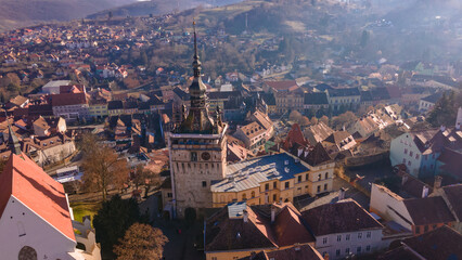 Birds eye view over Sighisoara city. Aerial photography of medieval city of Sighisoara from...