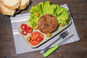 Pljeskavica,  grilled dish of minced meat. Balkan cuisine