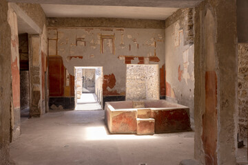 Laundry of Stephanus house (Fullonica di Stephanus) interior with stone bathtub, Pompeii, Naples, Italy