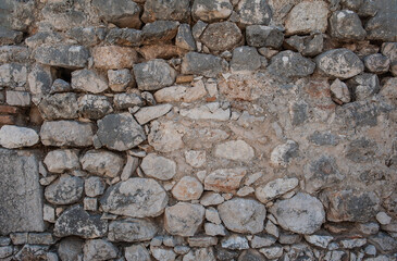 Ancient wall background with old concrete bricks