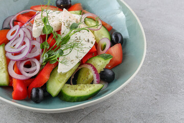 Greek salad on a stone background studio shooting 2