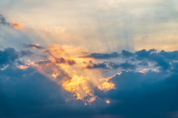Dramatic cloudy sky background. Orange cloudy sunset sky.