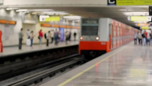 Out of focus image of the Mexico City subway leaving the station on a typical day