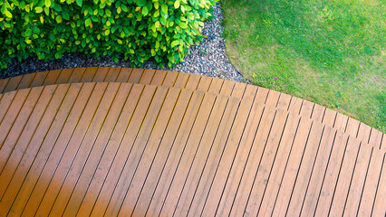 garden terrace made of exotic wood, cleaned with a high-pressure washer and oiled - condition after conservation and renovation of the wooden surface. - 724063723