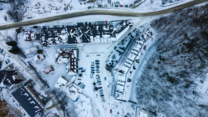 Winter aerial view of the Ski Resort Kopaonik. A complex of hotels on the at an altitude of 1080 m from sea level. Aerial view of the popular mountain town Brzece, Serbia, resort for all season - obrazy, fototapety, plakaty