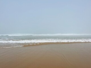 foggy ocean coast, fog at the ocean beach