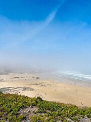 foggy ocean coast, fog at the ocean beach