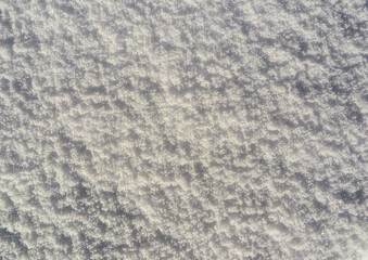 Abstract background from the surface of snow, top view.