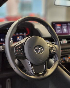 White Toyota Supra Mk.5 New Generation steering wheel focused shot