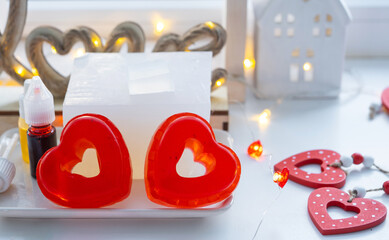 Handmade homemade soap in the shape of hearts for a Valentine's Day gift to your beloved. Perfumes...