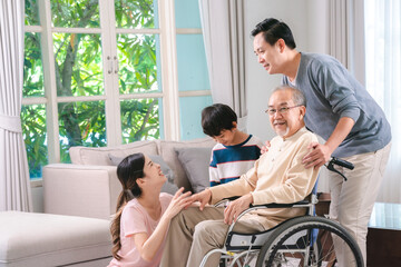 Gentle daughter, son and grandchild are taking care and support help their retired and elderly...