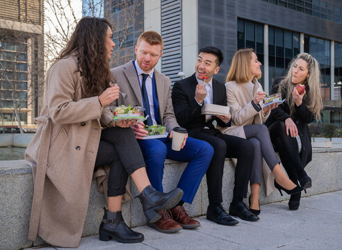 group business office people eating salad healthy life