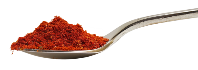 Spoon with red pepper powder isolated on white or transparent background