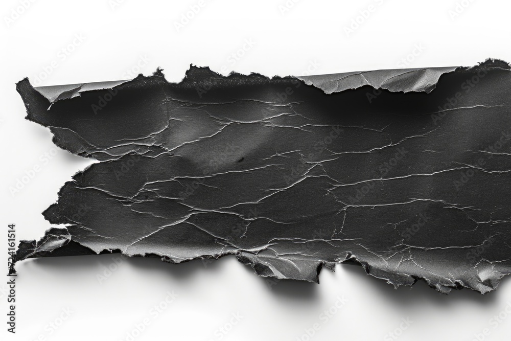 Aufkleber a torn piece of black paper on a white surface. suitable for various graphic design projects