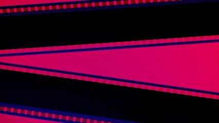 Two black film strips on red background close up. 35mm film slide frame. Copy space.