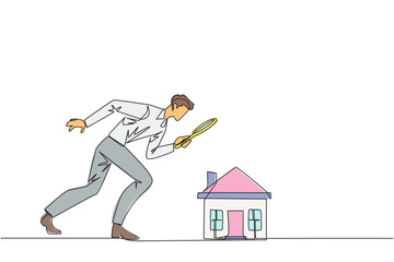 Single one line drawing of young businessman holding magnifying glass looking at miniature house. Get ready to make passive income after viewing a house. Continuous line design graphic illustration