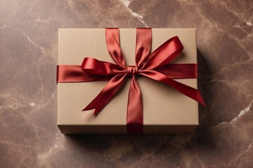 luxury gift box with shiny red bow on marble background, present decor with ribbon