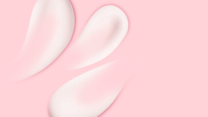 Smears of white cream on pink background