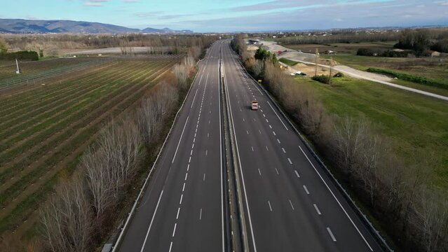 Loriol sur Drome, France - January 27, 2024: Empty A7 Sunny Motorway in France. Farmers' Protest, Tires, Tractors, Agricultural Machines on the Highway, completely blocking road traffic.