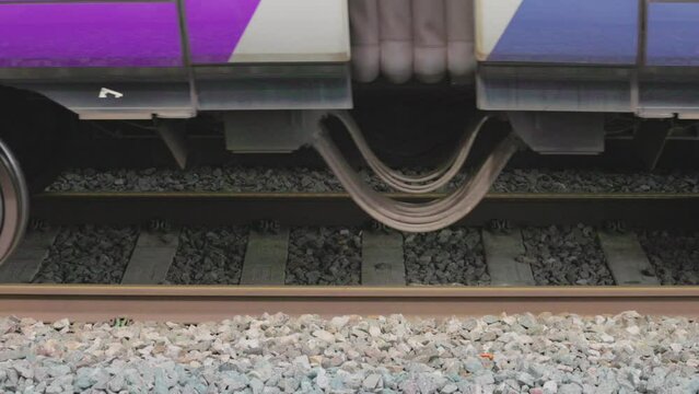 uk train going across railway, train system, United Kingdom transportation